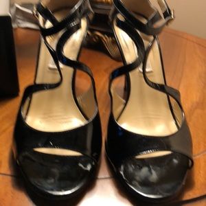 size 9 strappy sandals from Saks Fifth Avenue.
